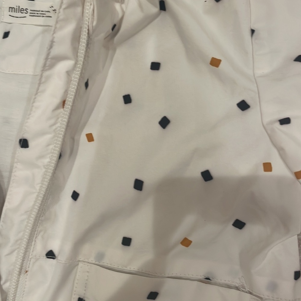 Miles Raincoat in white black and mustard yellow confetti pieces - Picture 4 of 5
